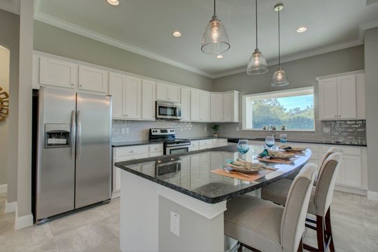 Kitchen island in new Freedom Model by Triple Crown Homes