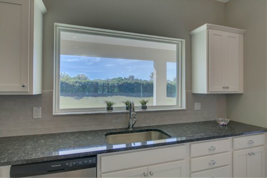 Kitchen in new Freedom Model by Triple Crown Homes