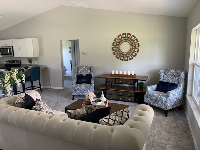 living room with vaulted ceiling