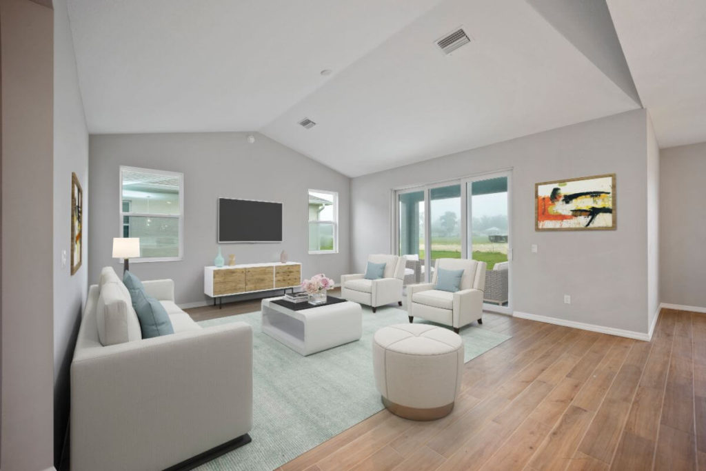 Living room with vaulted ceiling and oversized windows